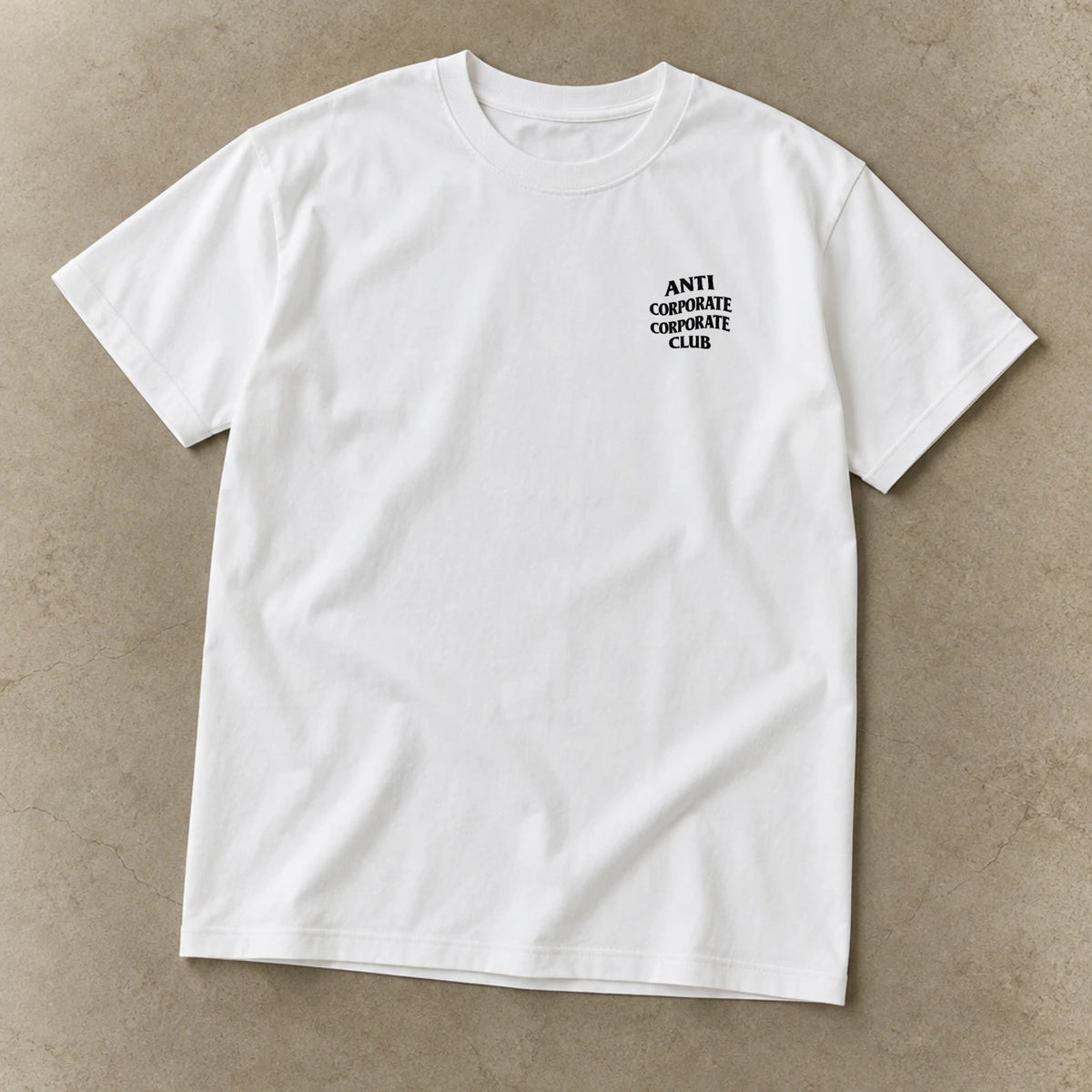 Anti-Corporate Corporate Club Shirt, garment-dyed unisex tee laid flat
