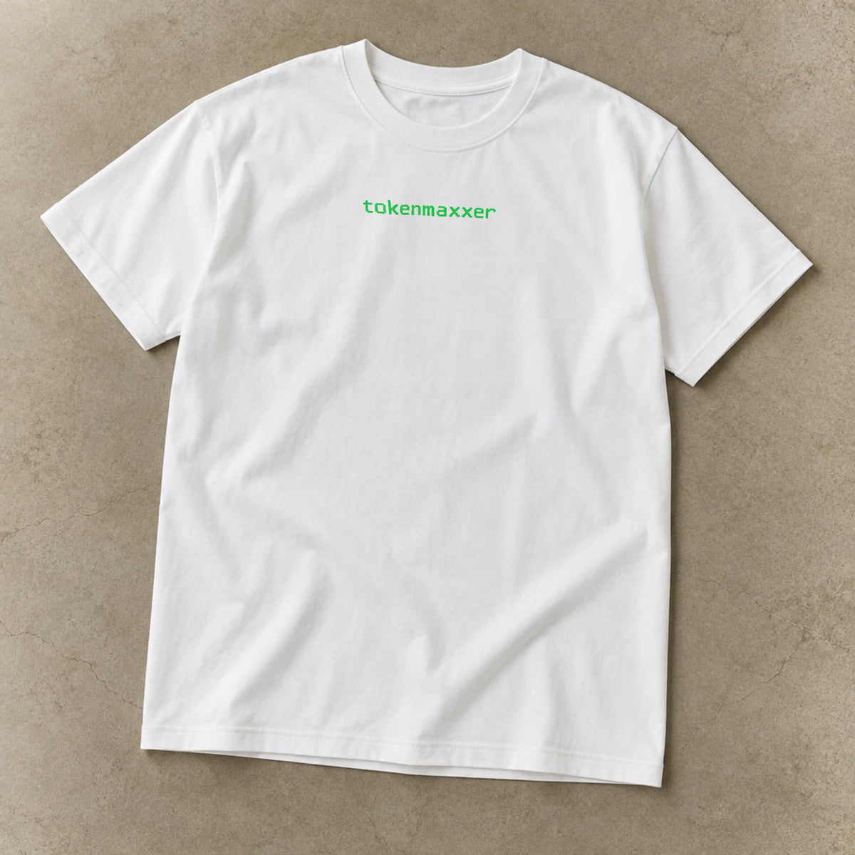 Tokenmaxxer Shirt, garment-dyed unisex tee laid flat
